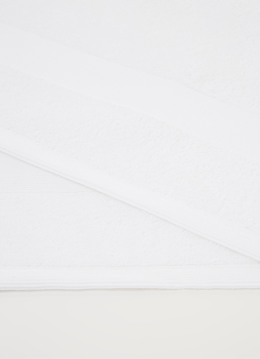 de Bijenkorf Home  Softness badlaken - 600 gr/m2 - 70 x 140 cm - detail wit