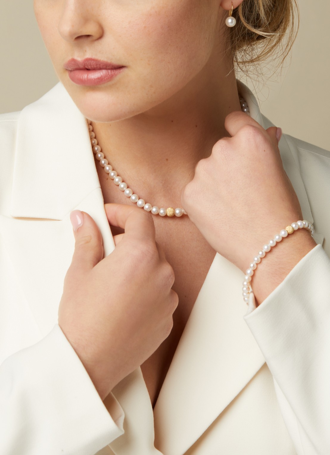 Diamond Point Geelgouden armband witte zoetwaterparel Rivièra - voorkant 2 wit