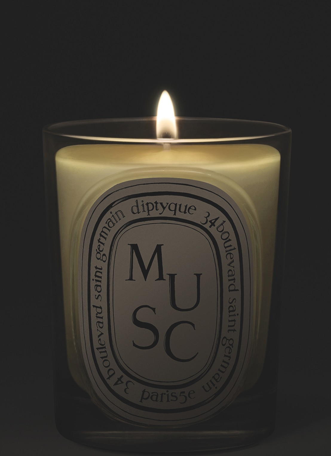 DIPTYQUE Musc Classic geurkaars 190 gram - voorkant 2 beige