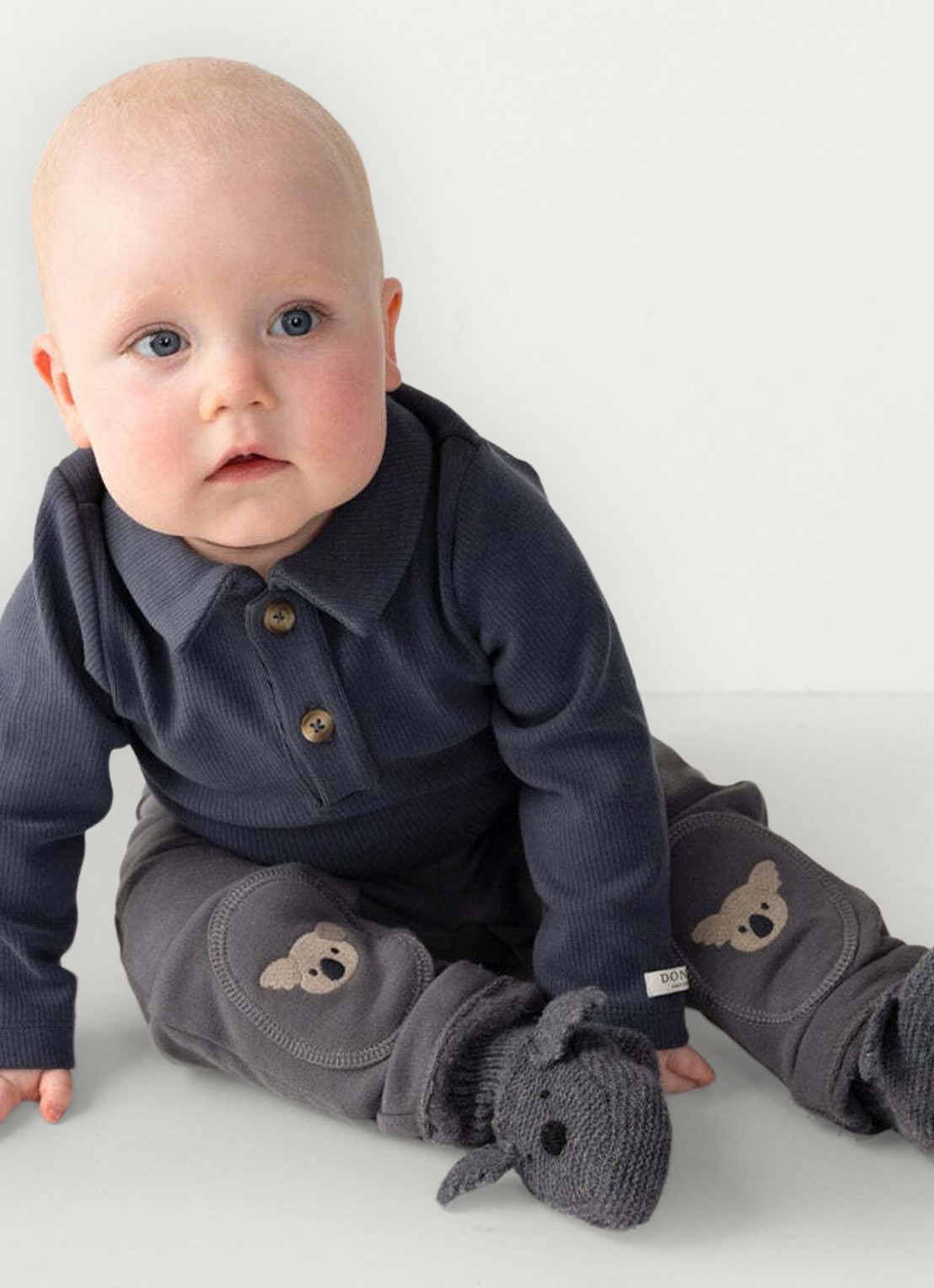 Donsje Amsterdam Babyslofjes van wol - detail donkergrijs