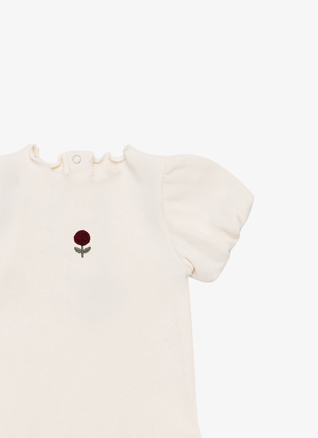Donsje Amsterdam Nowie Rose romper met pofmouw - detail ivoor