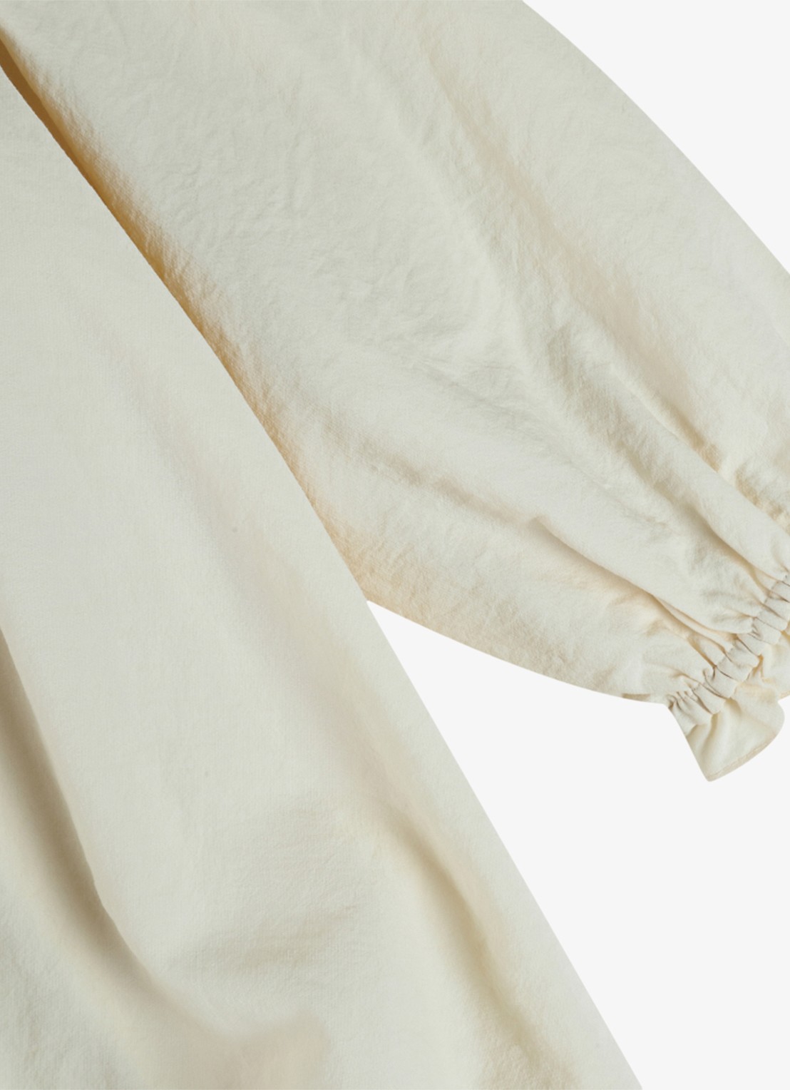 Donsje Amsterdam Nyari jurk met plooien - detail 5 creme