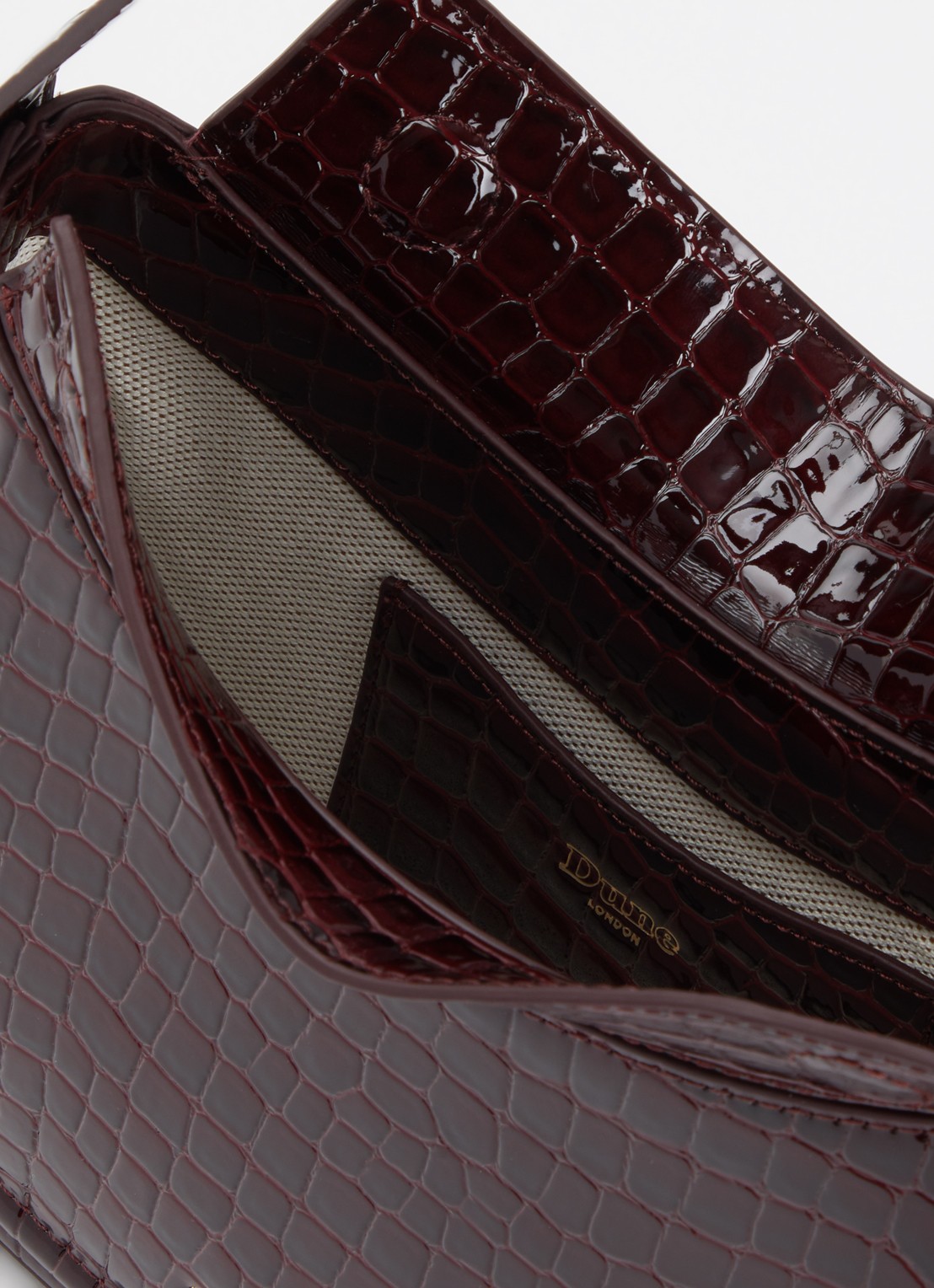 Dune London Dependent schoudertas van suède met details van leer  - detail rood