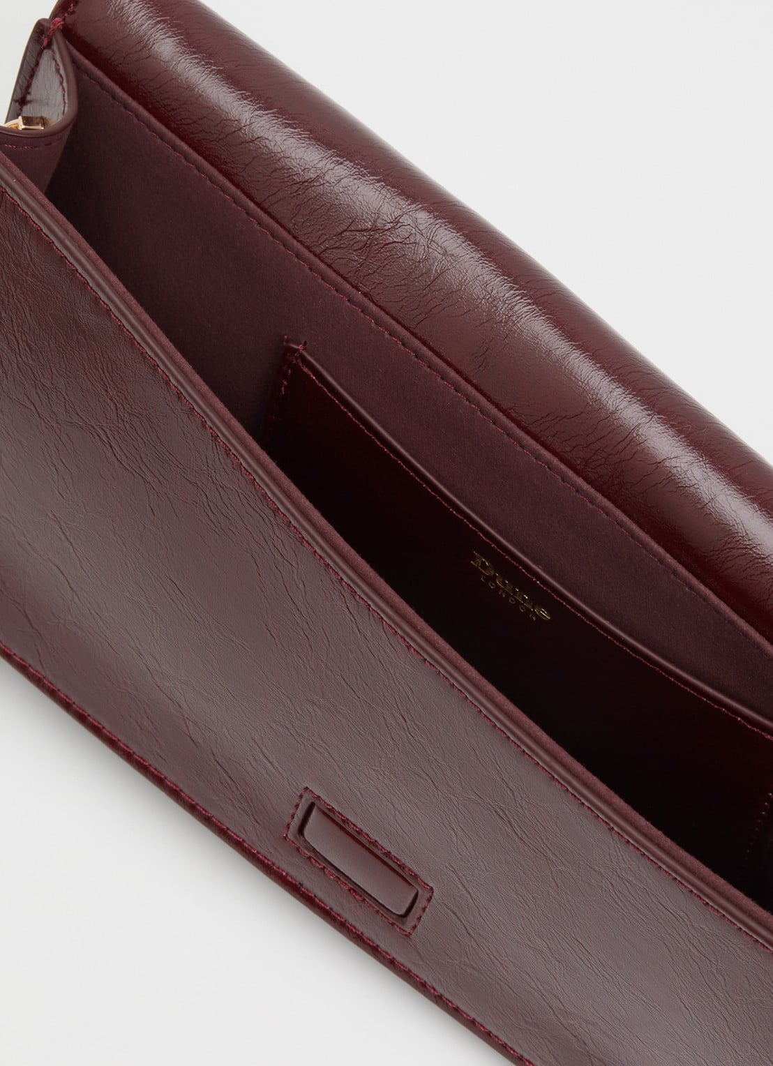 Dune London East To West Long clutch met crocostructuur - detail 2 bordeauxrood