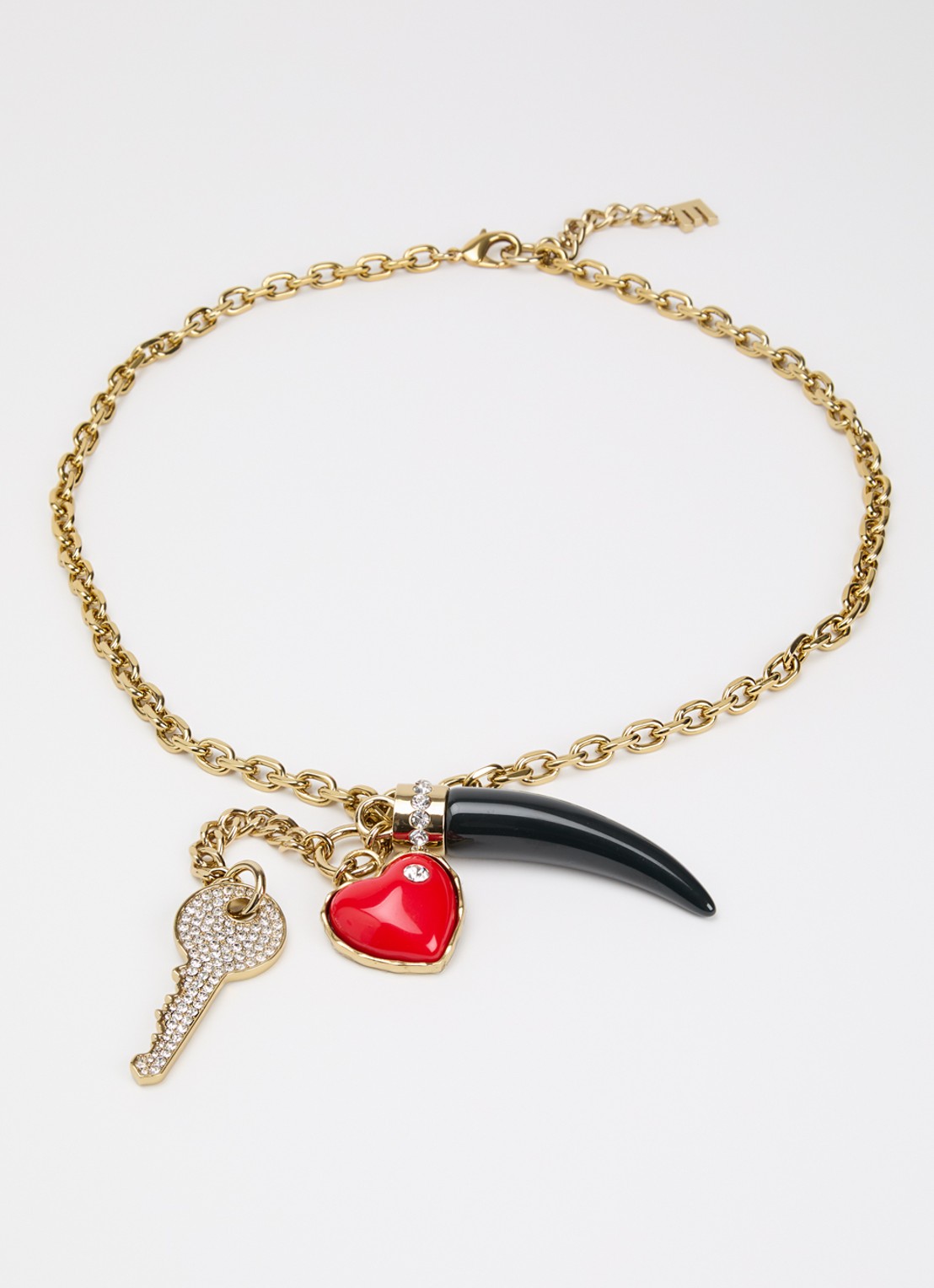 Essentiel Antwerp Koma ketting met hanger - detail goud