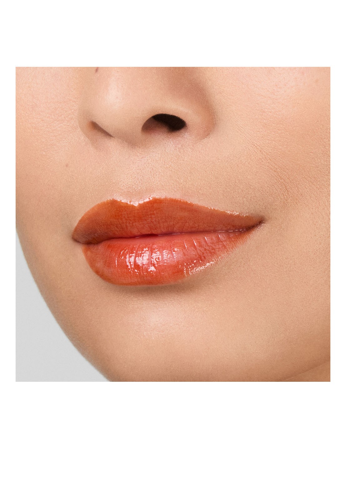 Estée Lauder Pure Color Melt On Glosstick - lipgloss - detail 3 890 melted tangerine