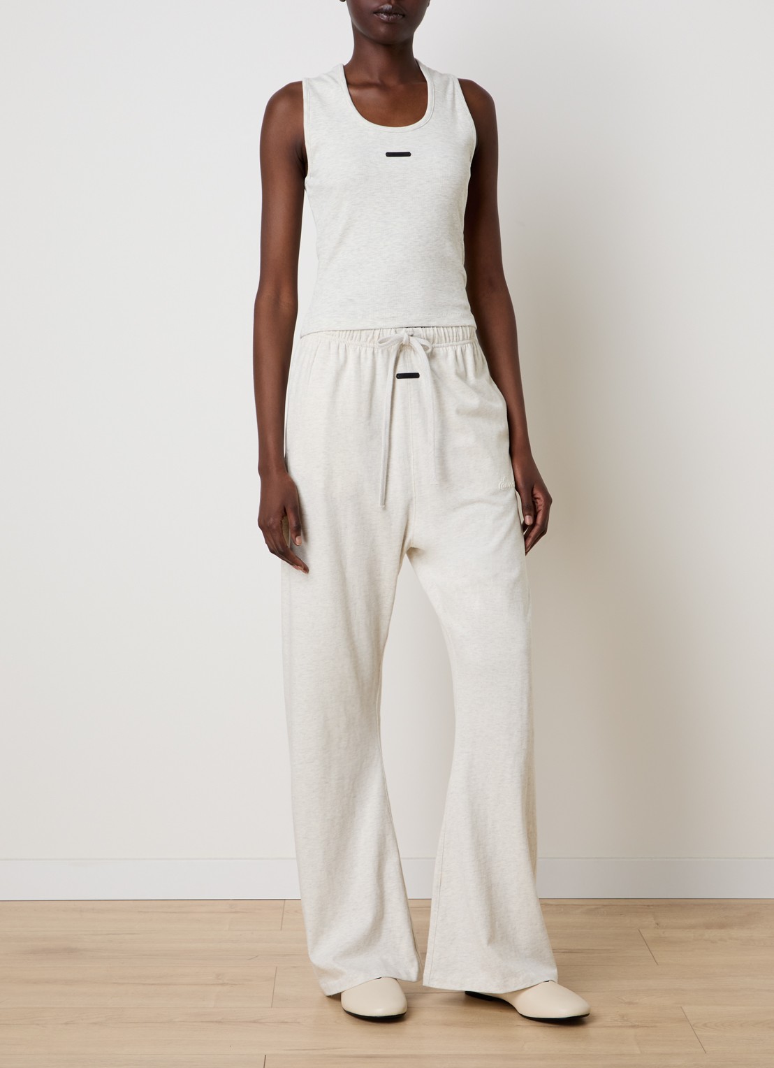 Fear of God Essentials High waist flared fit broek met steekzakken - voorkant 2 lichtgrijs