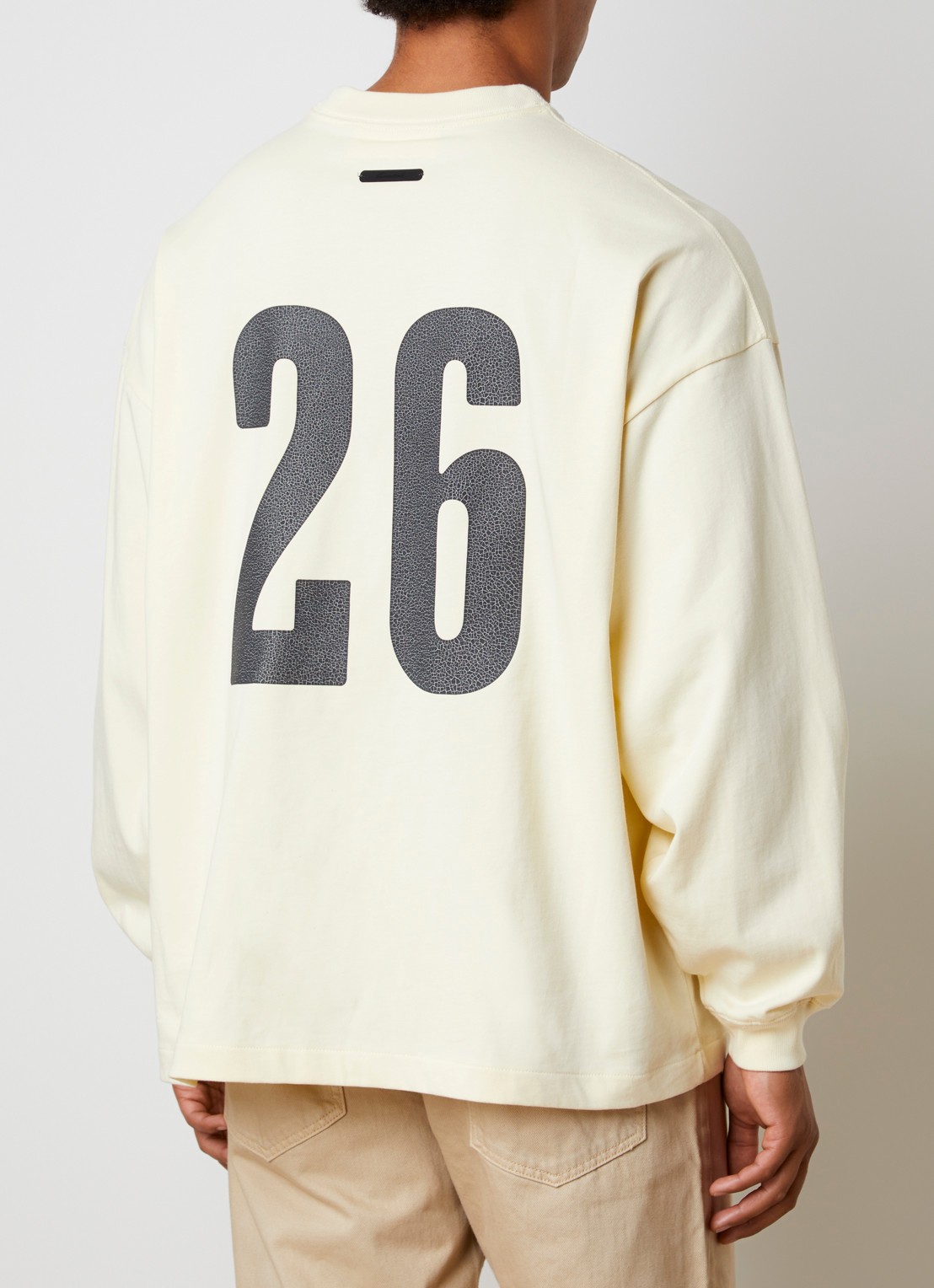 Fear of God Essentials Longsleeve met front- en backprint - achterkant 3 lichtgeel