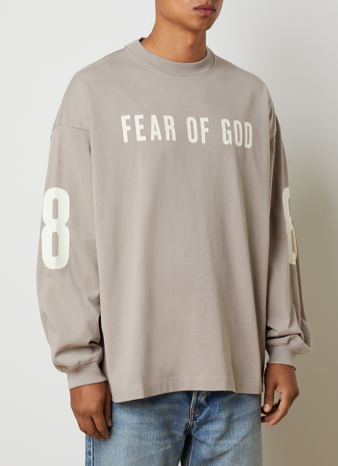 Fear of God Essentials Merch longsleeve met logo- en backprint - detail beige