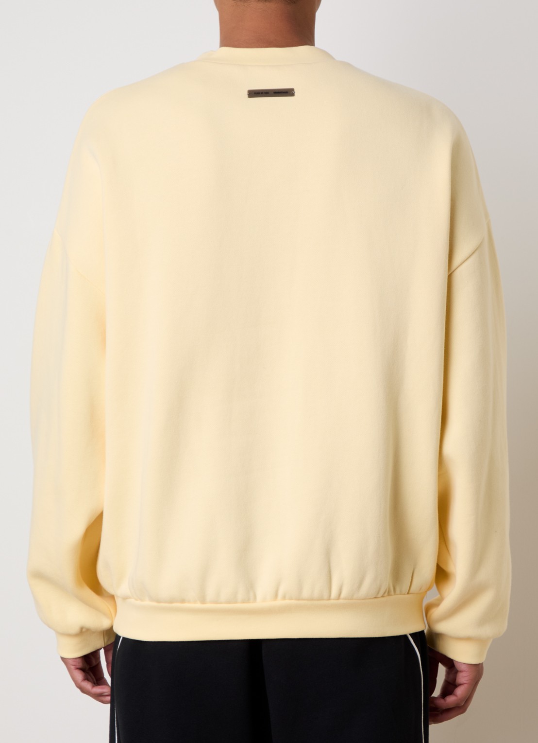 Fear of God Essentials Sweater met logoborduring - achterkant 5 lichtgeel
