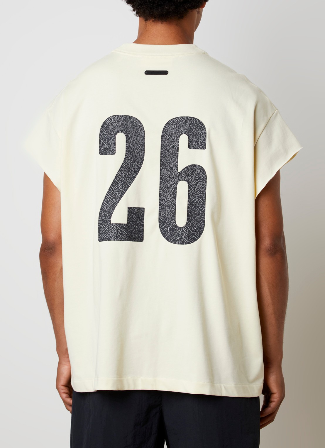 Fear of God Essentials T-shirt met front- en backprint - achterkant lichtgeel