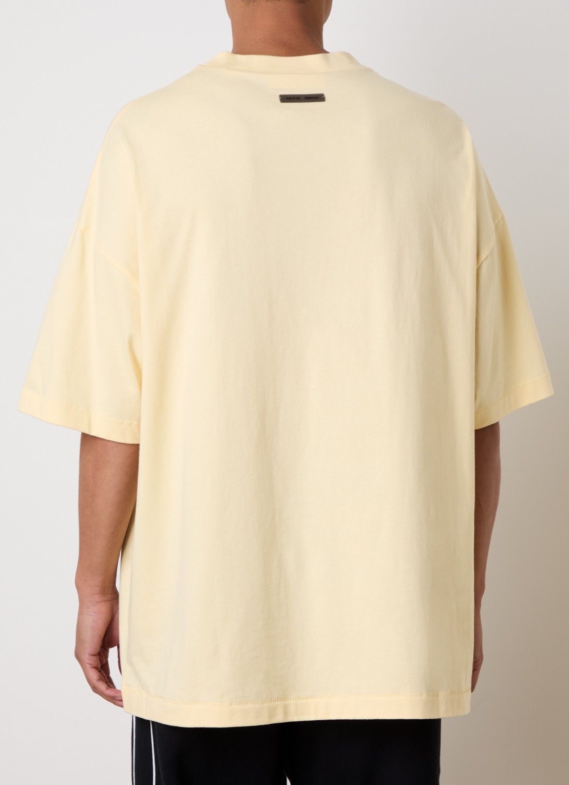 Fear of God Essentials T-shirt met logo - achterkant 5 lichtgeel