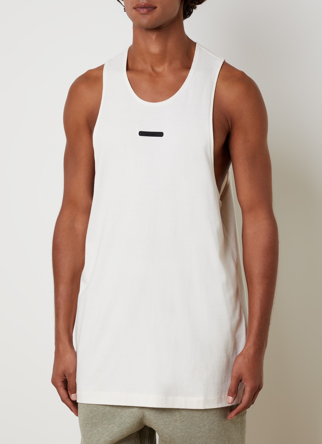 Fear of God Essentials Tanktop met logo - detail gebroken wit