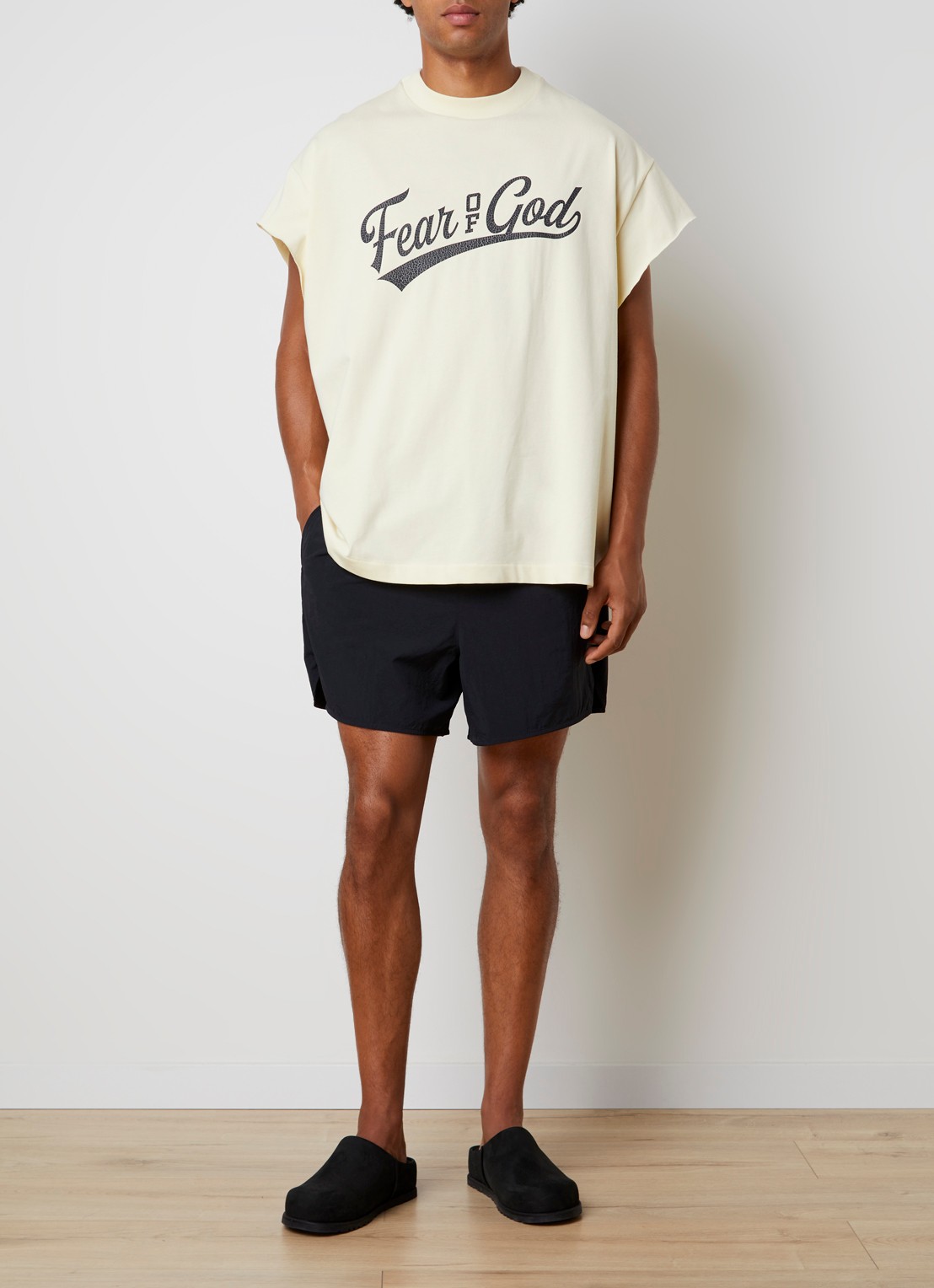 Fear of God Essentials Zwemshort met steekzakken - voorkant 4 zwart