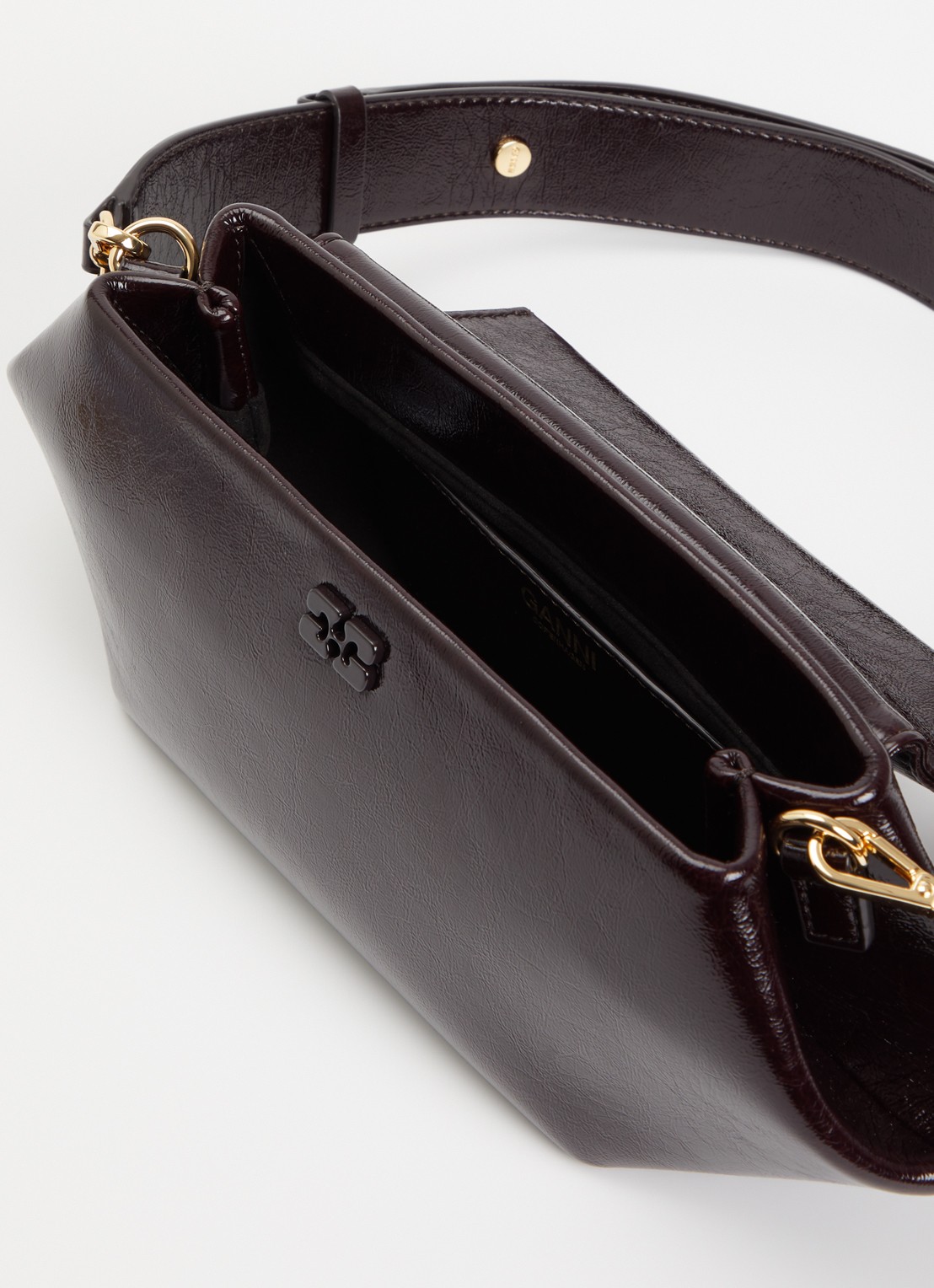 Ganni Bou East crossbodytas met etui en afneembare schouderriem - detail aubergine