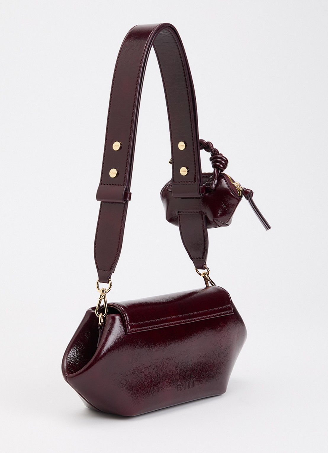 Ganni Bou East crossbodytas met etui en afneembare schouderriem - achterkant bordeauxrood