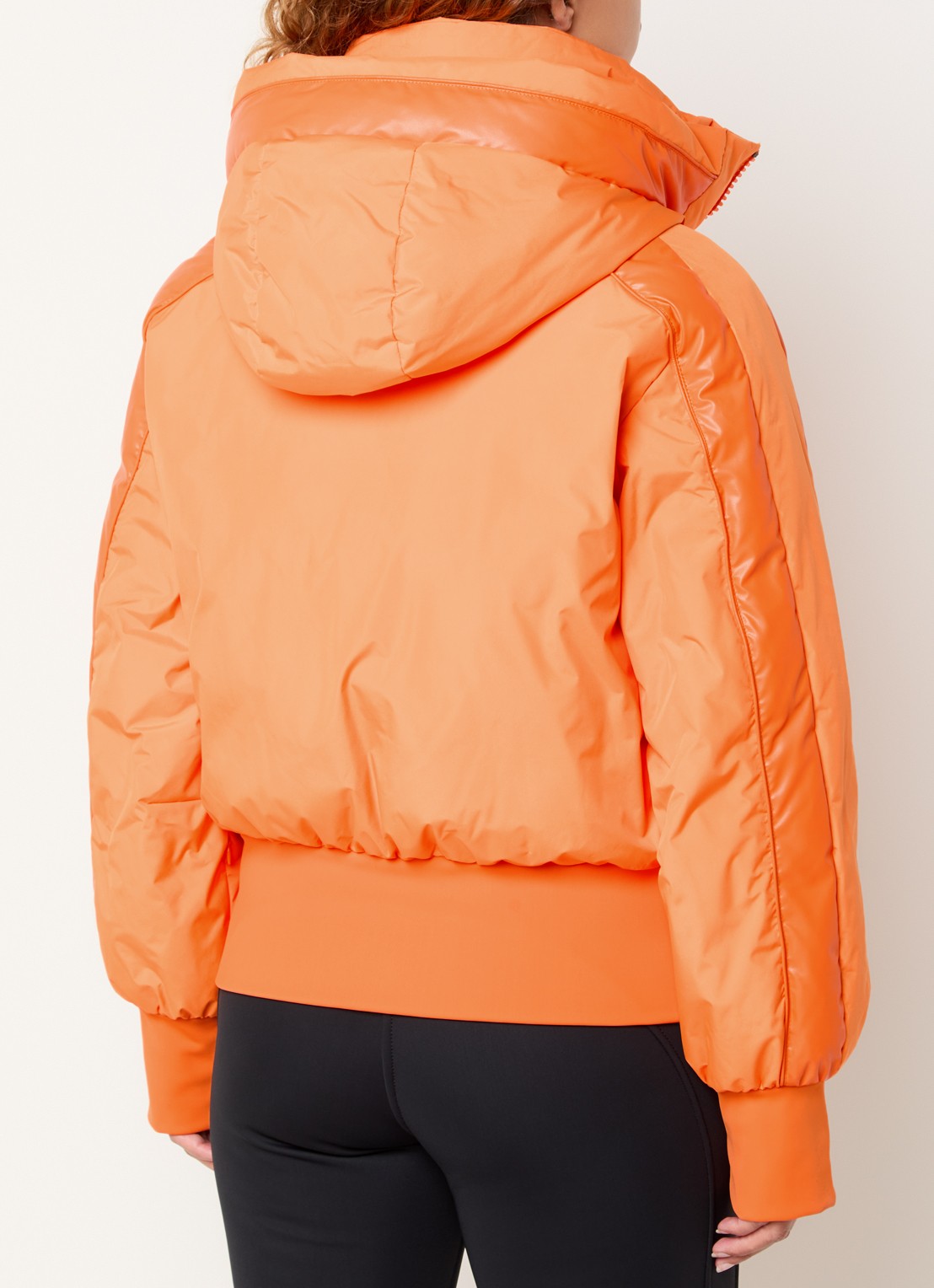Goldbergh Volare ski-jas met capuchon en ritszakken - achterkant oranje