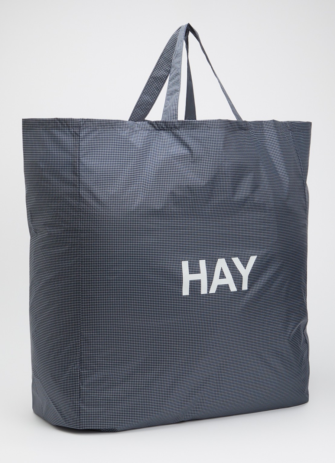 Hay Grid XL shopper met ruitdessin en logo - achterkant donkerblauw