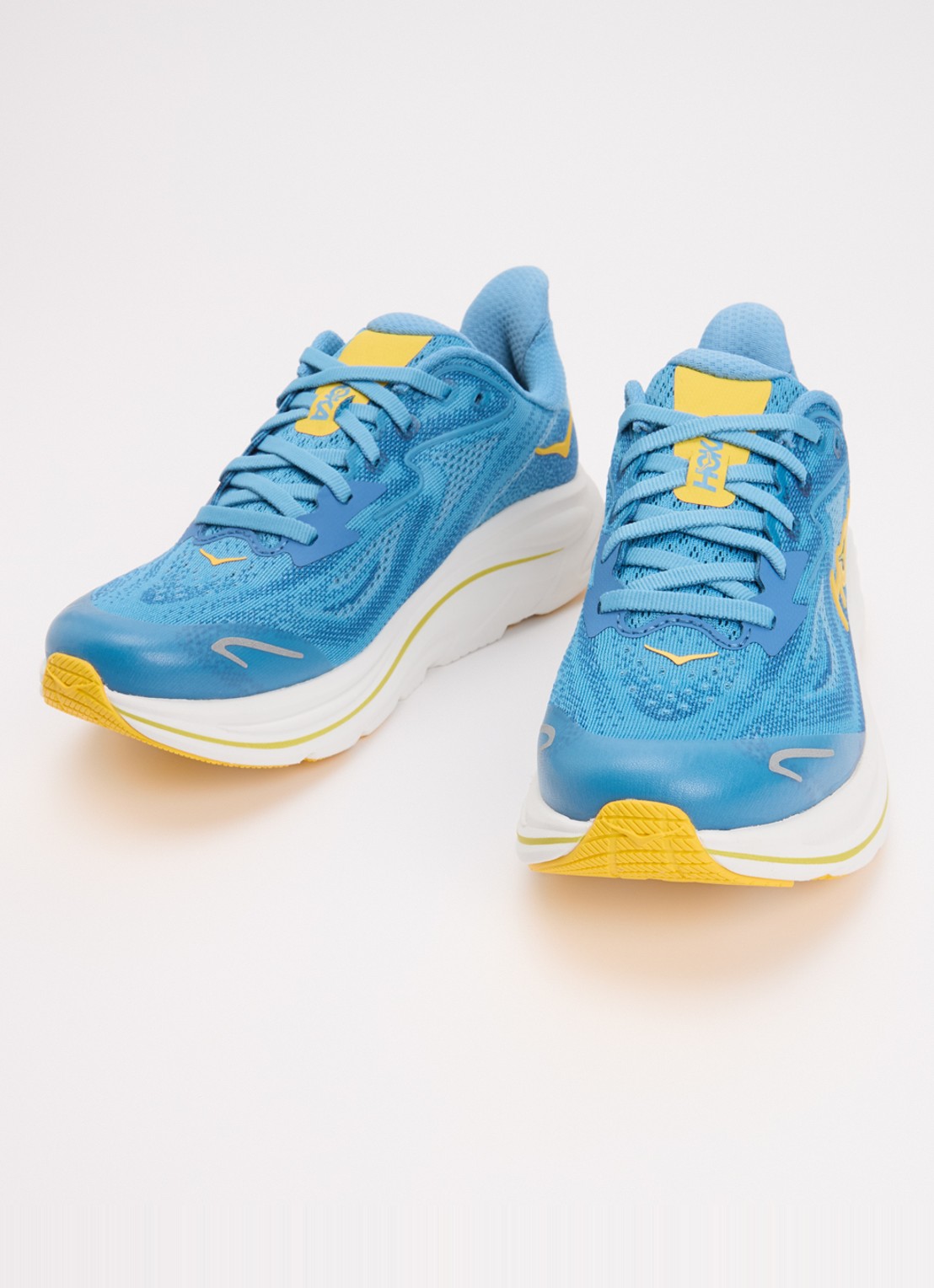 HOKA Clifton 10 hardloopschoen met gebreid bovenwerk en logo - detail 2 blauw