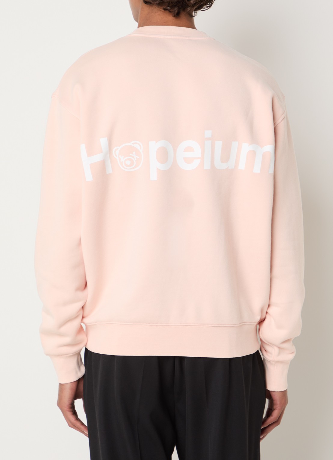 Hopeium Sweater met logo- en backprint - detail roze