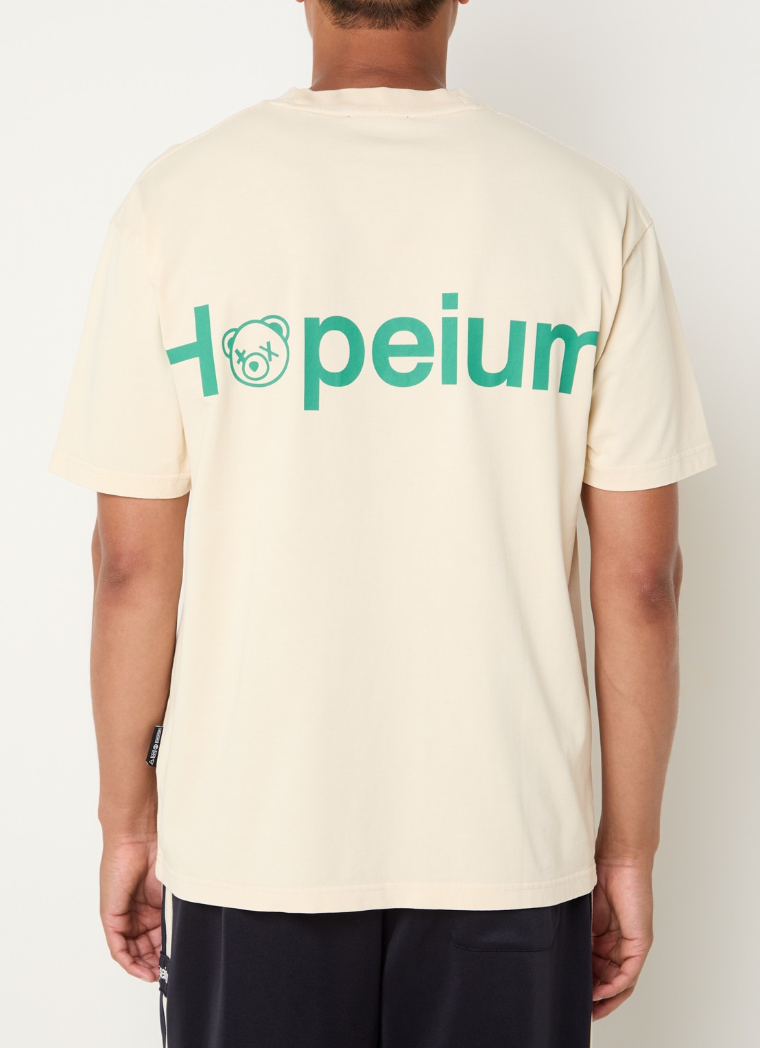 Hopeium T-shirt met logo- en backprint - detail lichtgeel