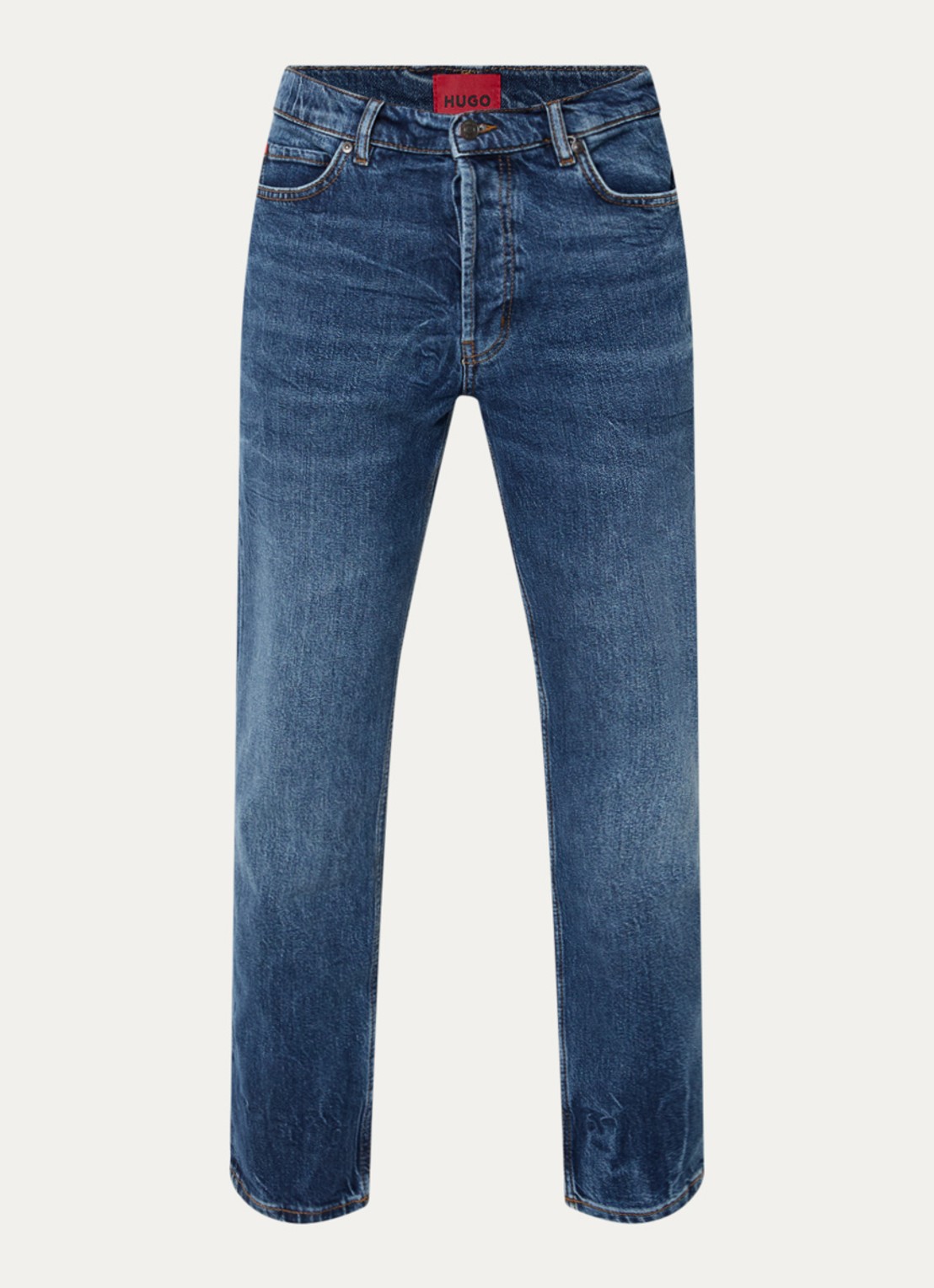 HUGO 634 tapered fit jeans met medium wassing - voorkant indigo