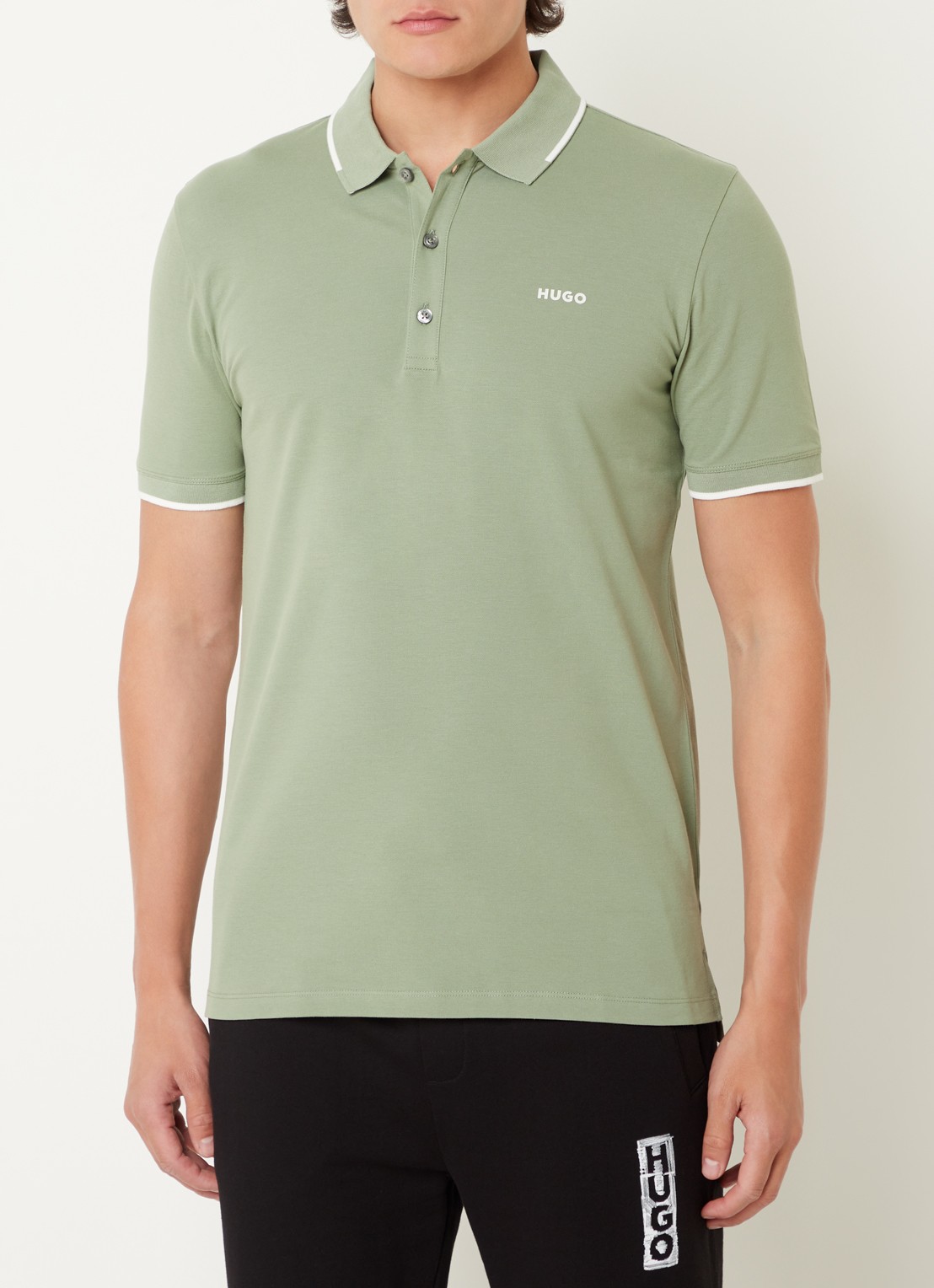 HUGO Dinoso slim fit polo van piqué katoen met logo - detail lindegroen