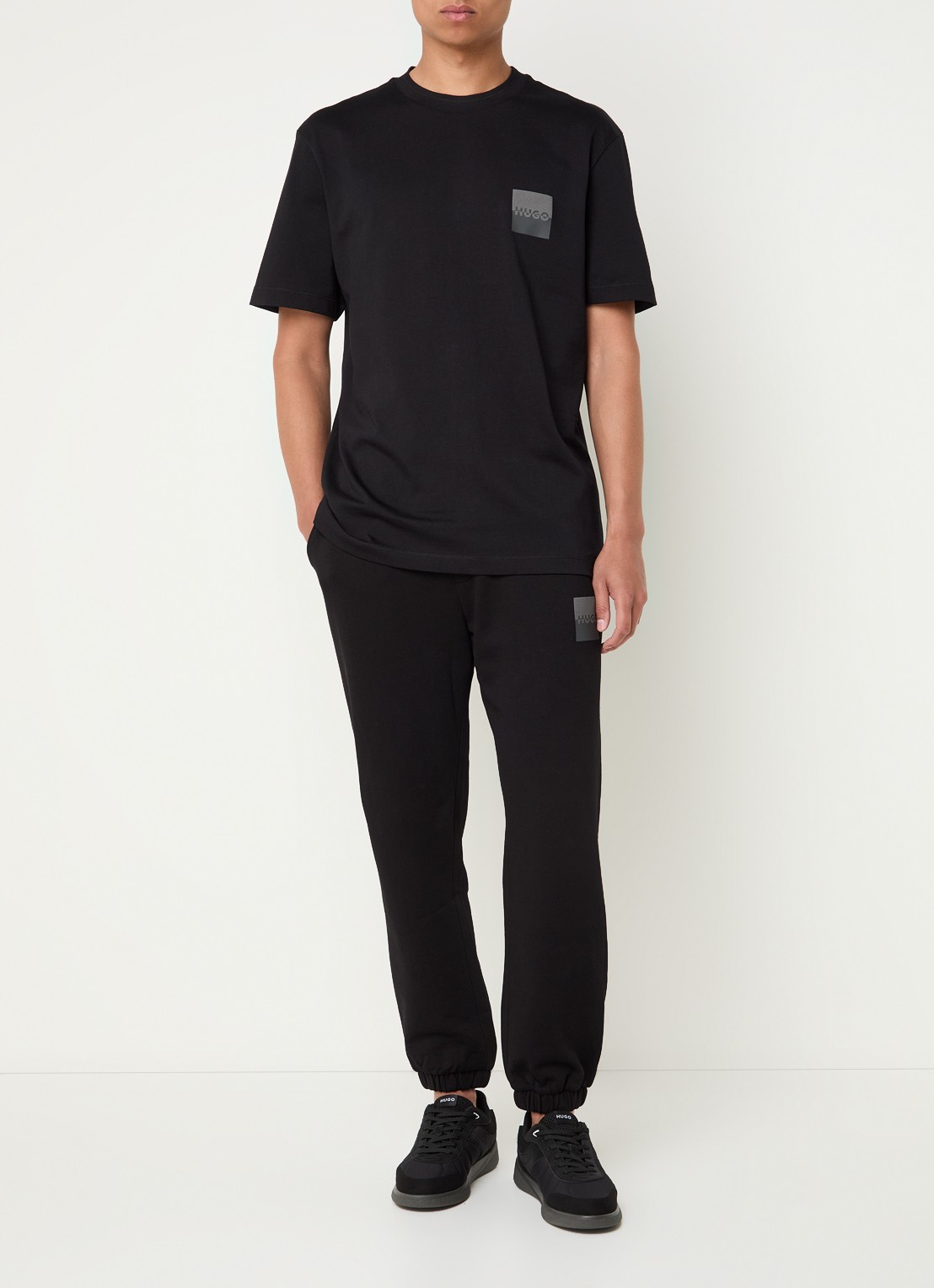 HUGO Dusplitan tapered fit joggingbroek met logo - voorkant 5 zwart