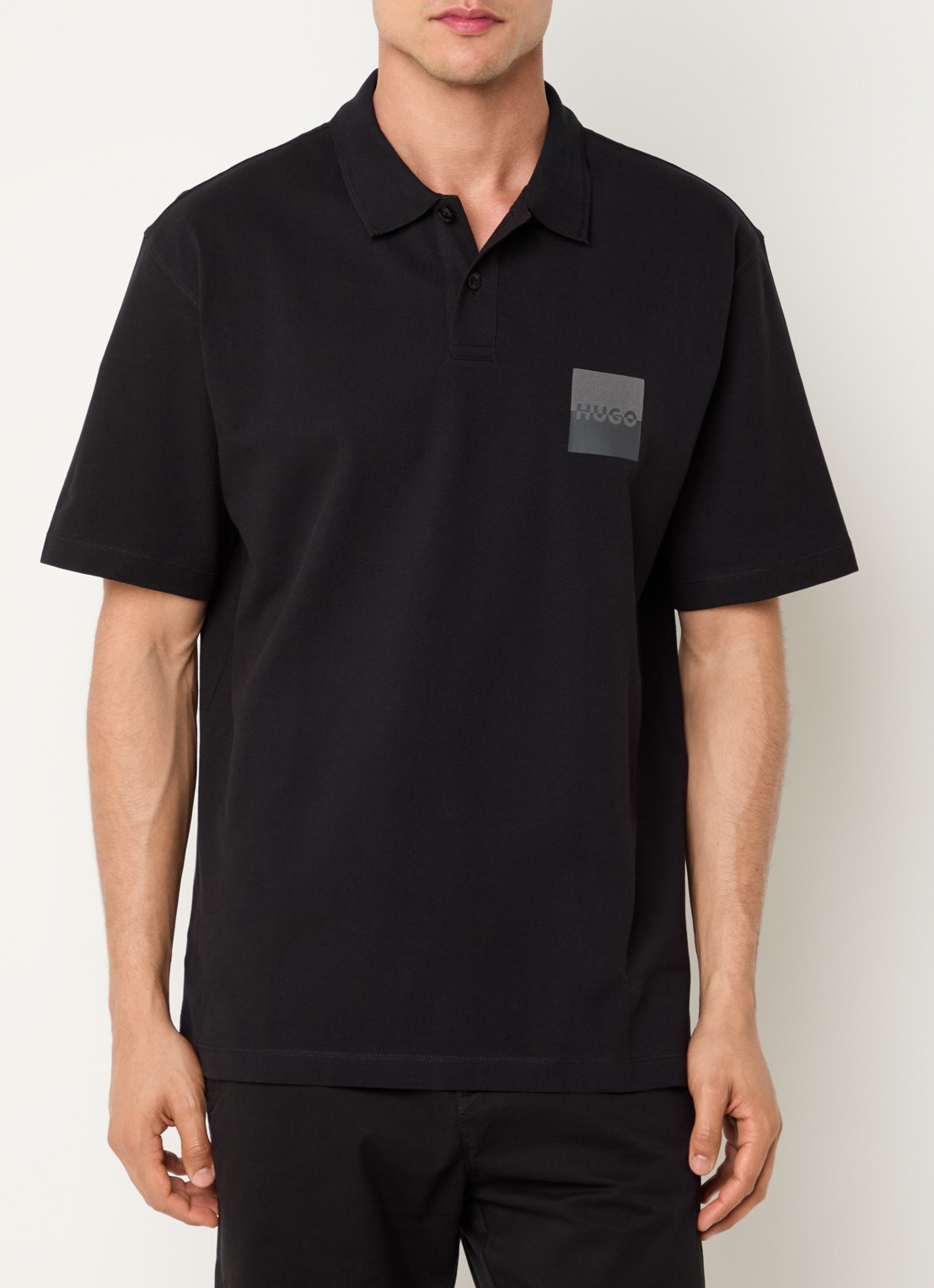 HUGO Dusplity regular fit polo van piqué katoen met logo - detail zwart