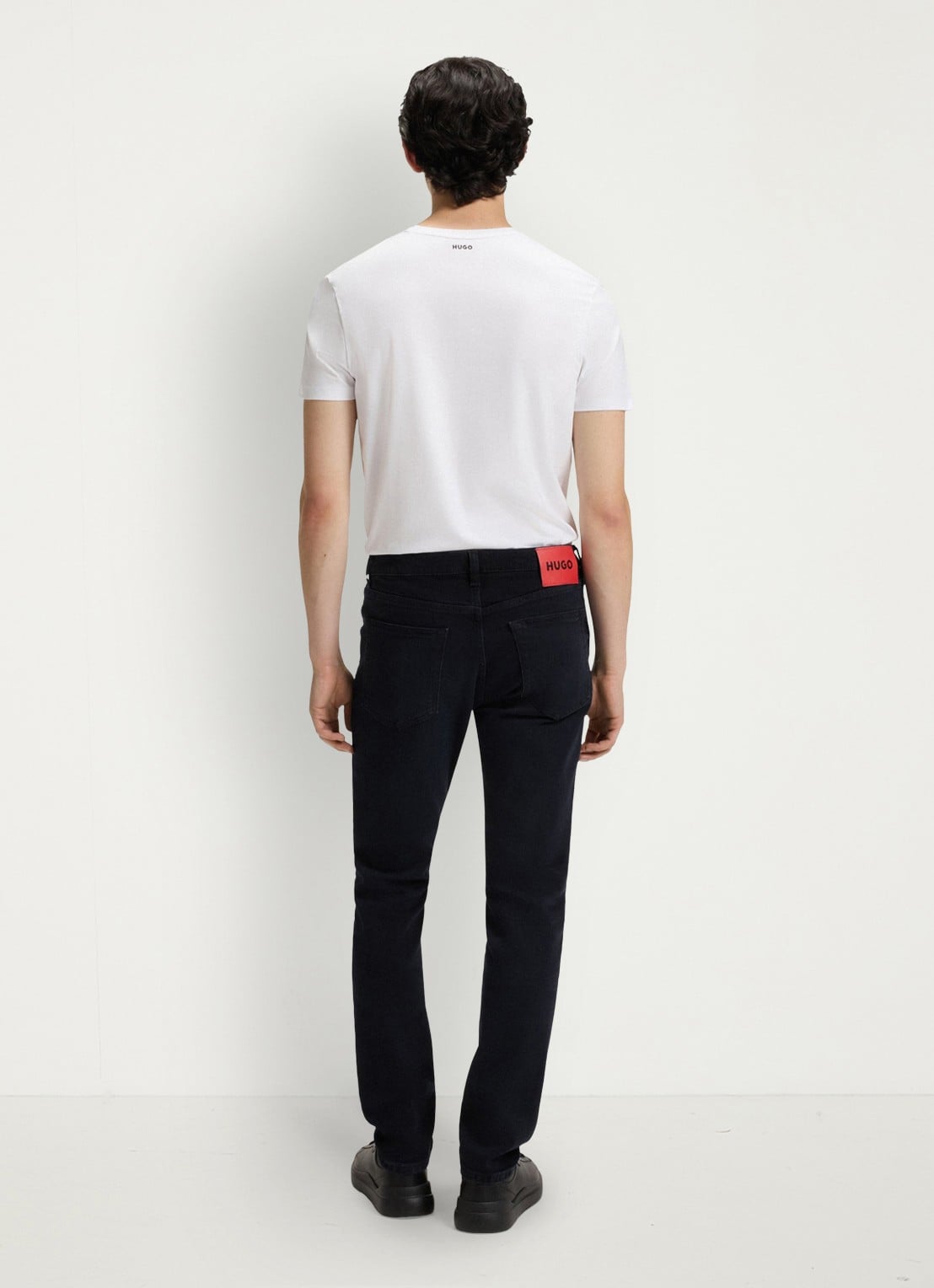 HUGO Slim fit jeans met donkere wassing - achterkant indigo