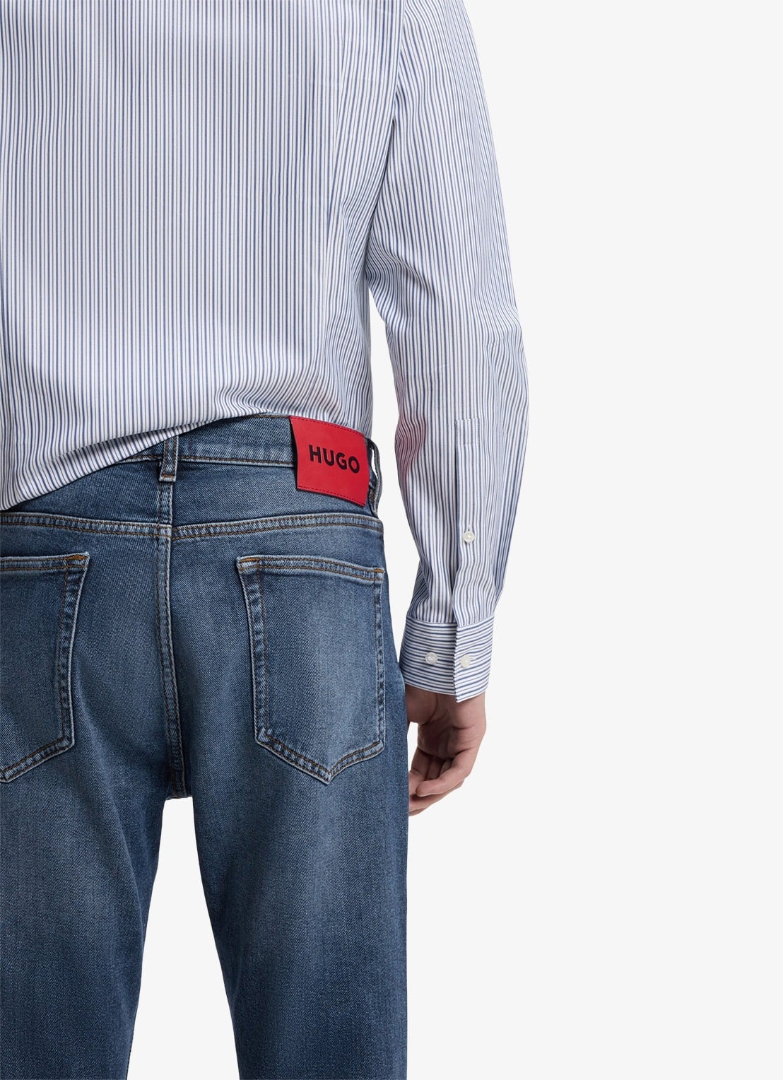 HUGO Slim fit jeans met steekzakken - detail 4 middenblauw