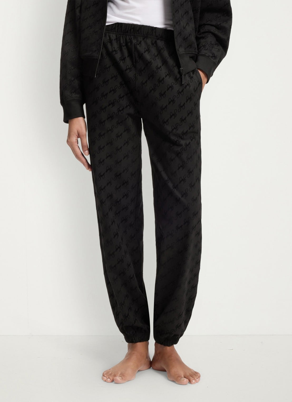 HUGO Tapered fit joggingbroek met logoprint - detail zwart