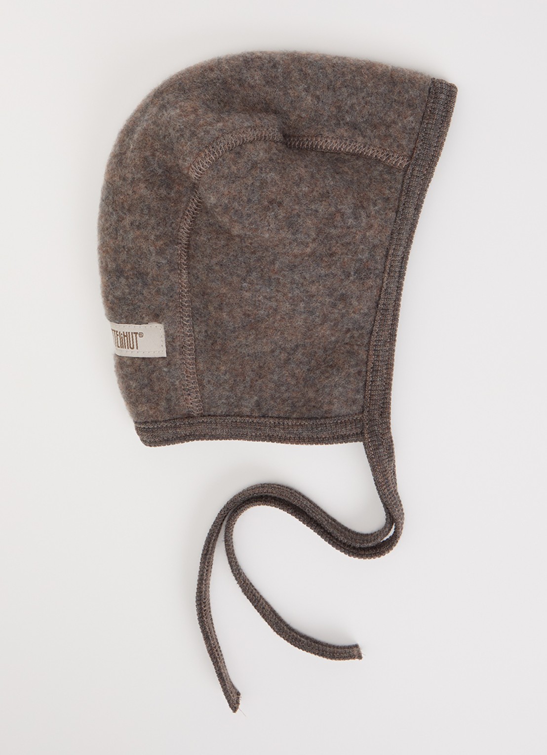 Huttelihut Babymuts van merino wol - voorkant donkerbruin