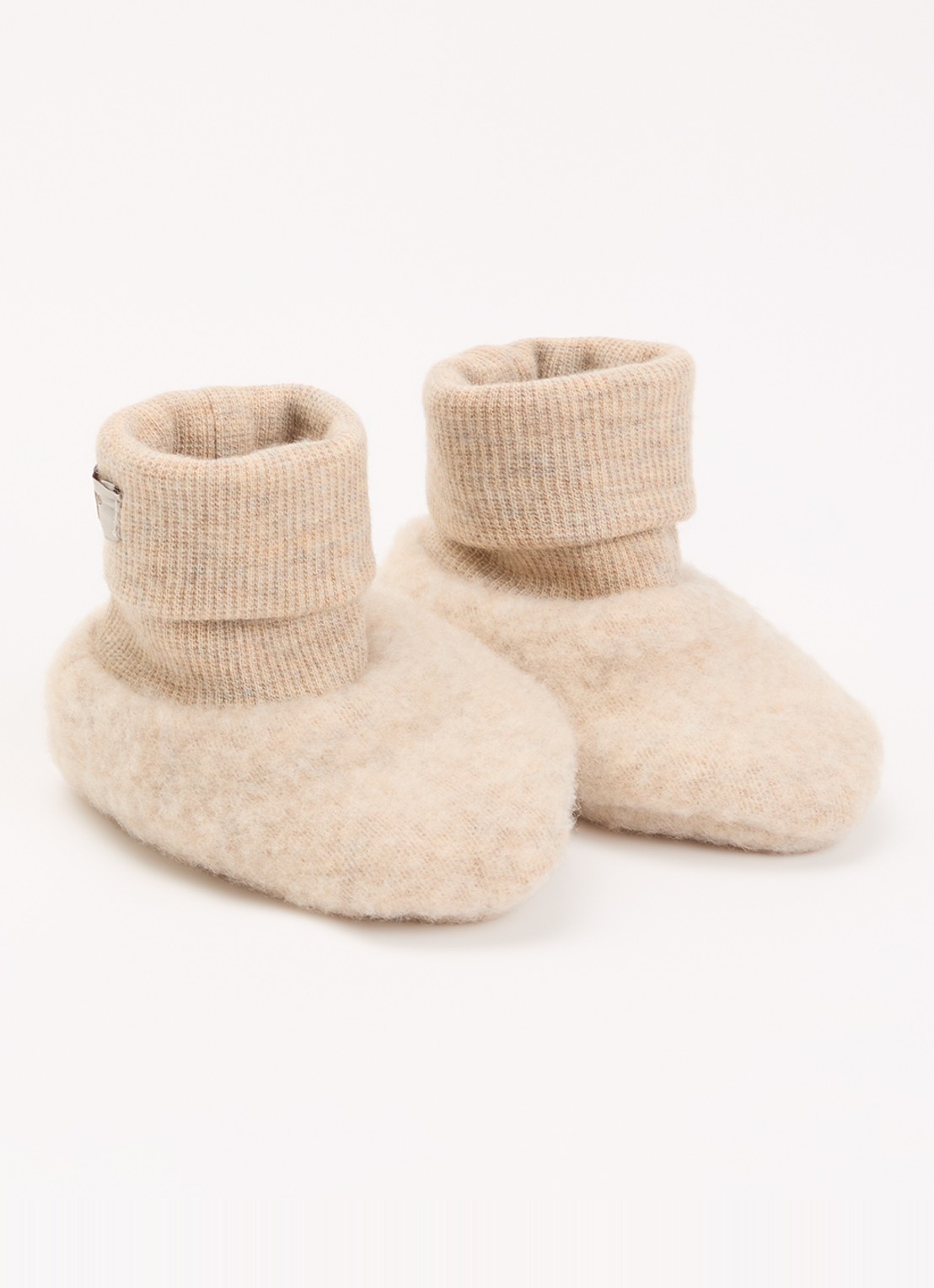 Huttelihut Babyslofje van merino wol - voorkant beige