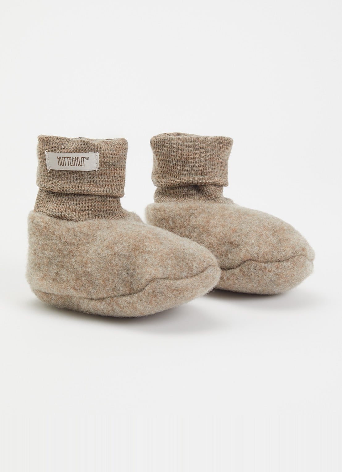 Huttelihut Babyslofje van merino wol - voorkant zand