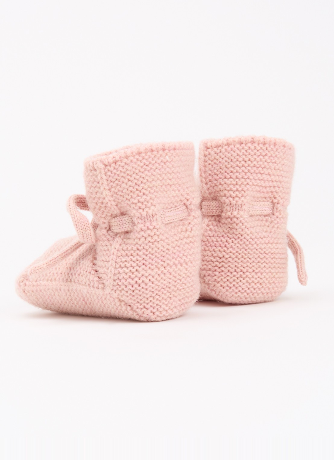 Hvid Babyslofjes van merino wol - achterkant 2 zalmroze