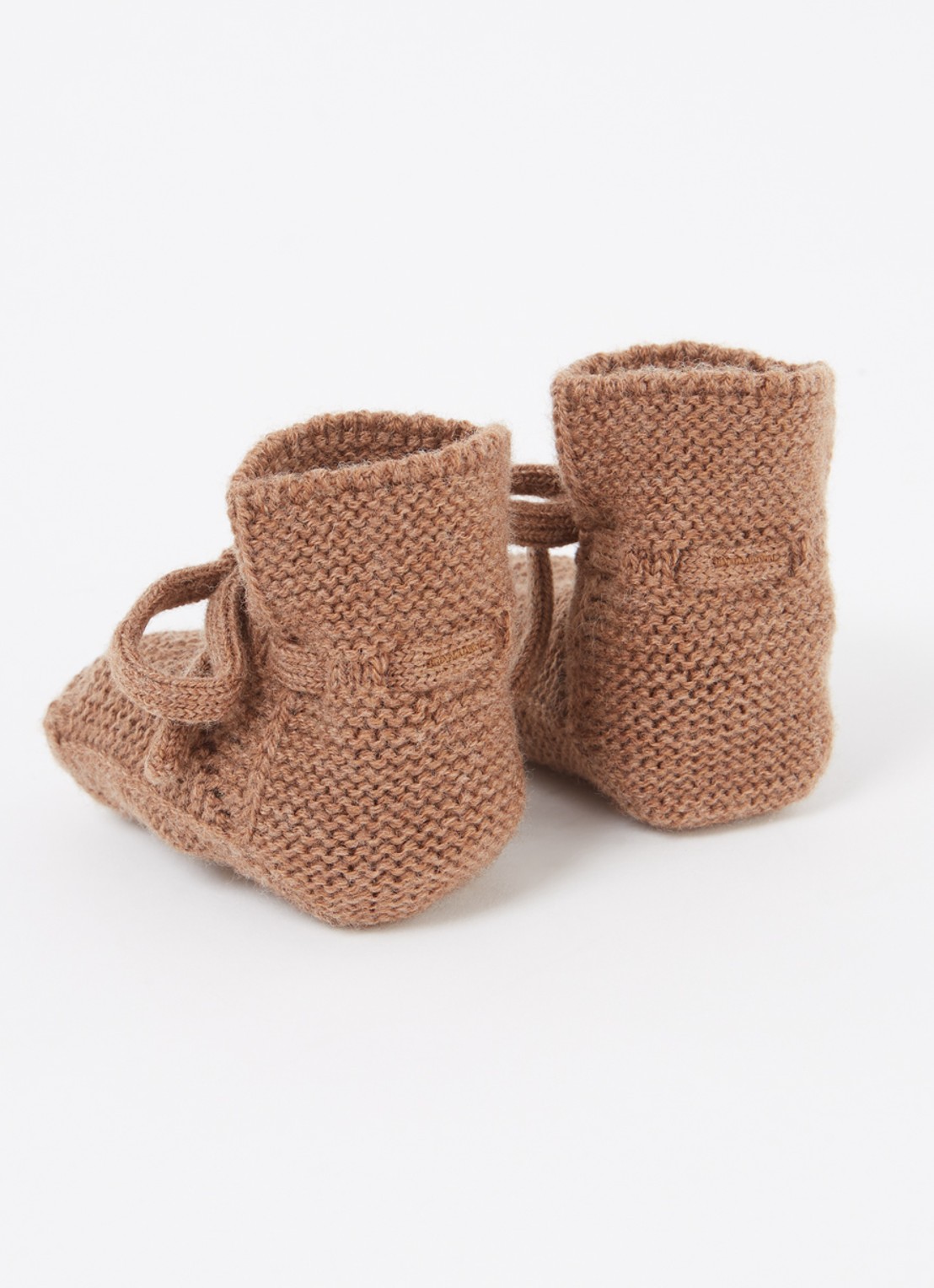 Hvid Babyslofjes van merino wol - achterkant 2 bruin