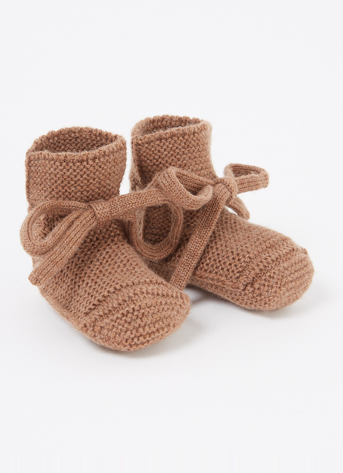 Hvid Babyslofjes van merino wol - voorkant bruin