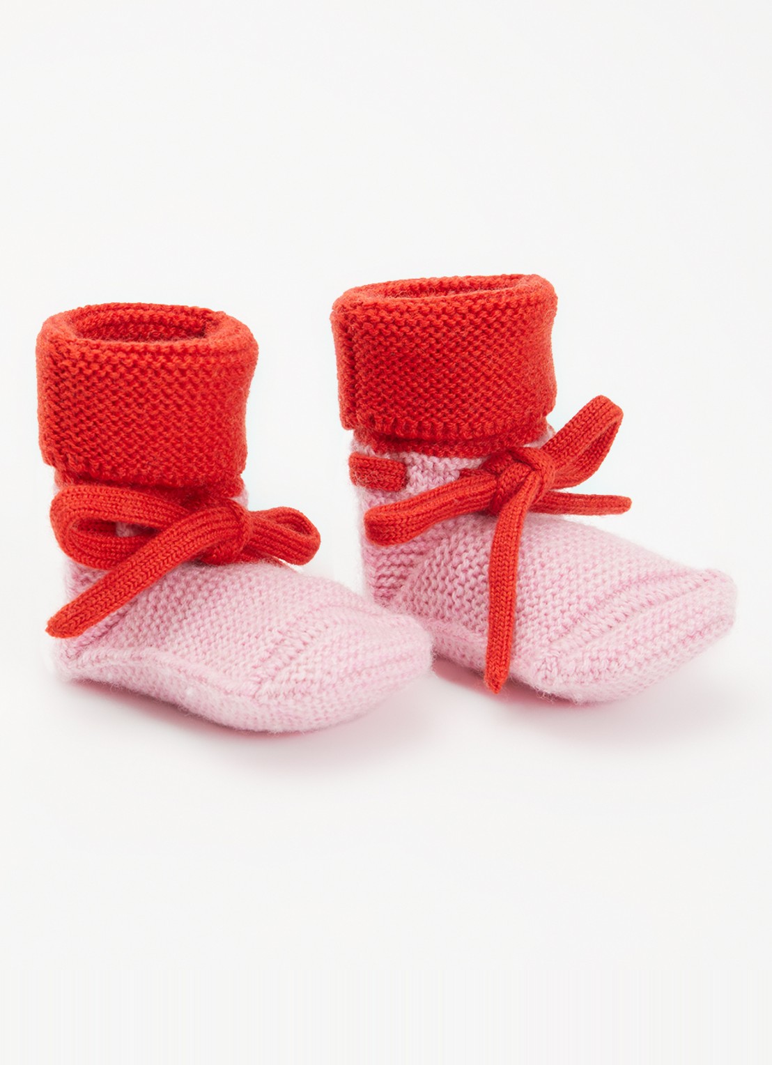Hvid Babyslofjes van merino wol  - voorkant 3 roze