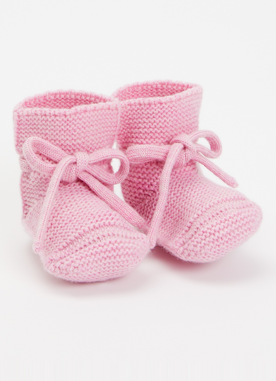 Hvid Booties babyslofjes met strikdetail - voorkant lichtroze