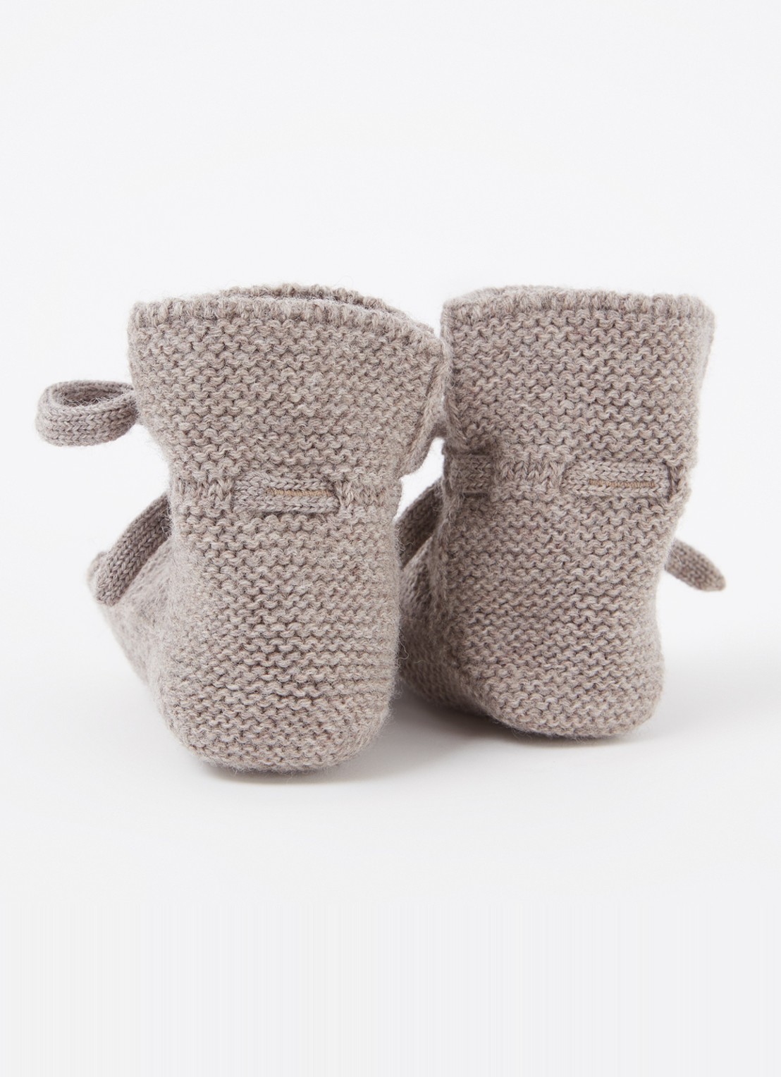 Hvid Booties gebreide babyslofjes van wol - achterkant lichtgrijs