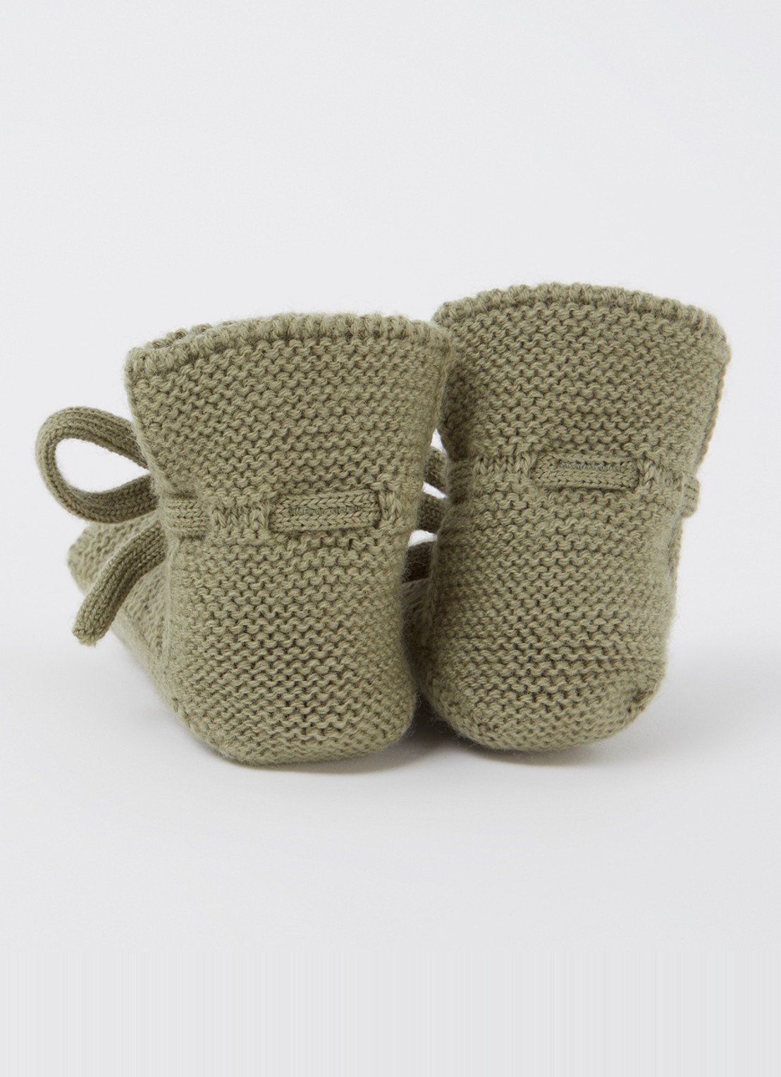 Hvid Booties gebreide babyslofjes van wol - achterkant mosgroen