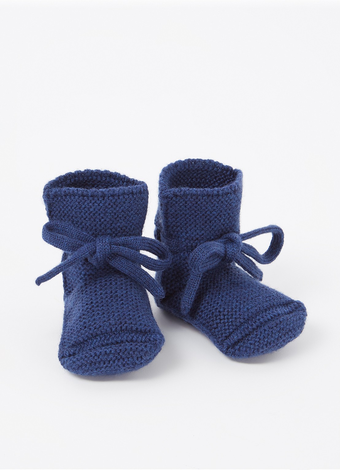 Hvid Booties gebreide babyslofjes van wol - voorkant 2 donkerblauw