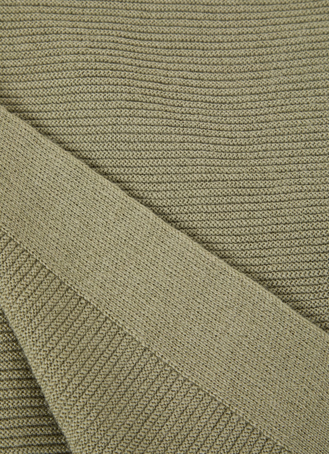 Hvid Felix wiegdeken van merino wol 70 x 95 cm - detail 2 olijfgroen