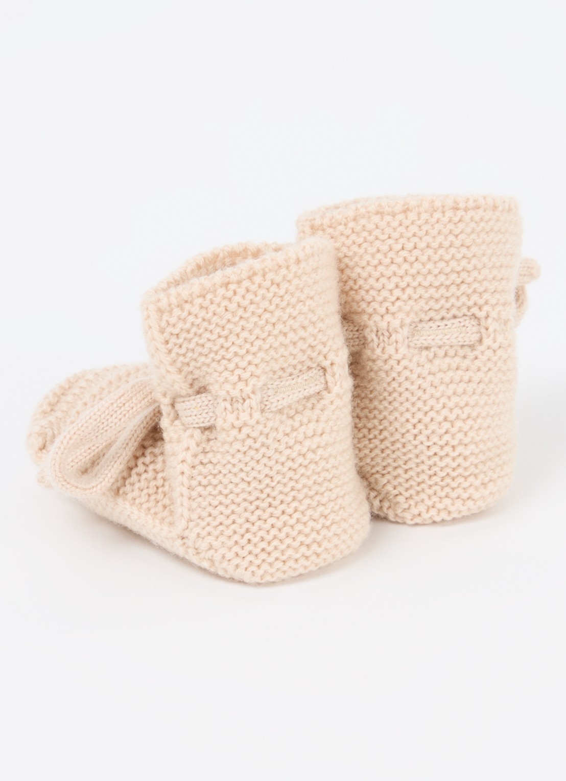 Hvid Gebreide babyslofjes van wol - achterkant creme
