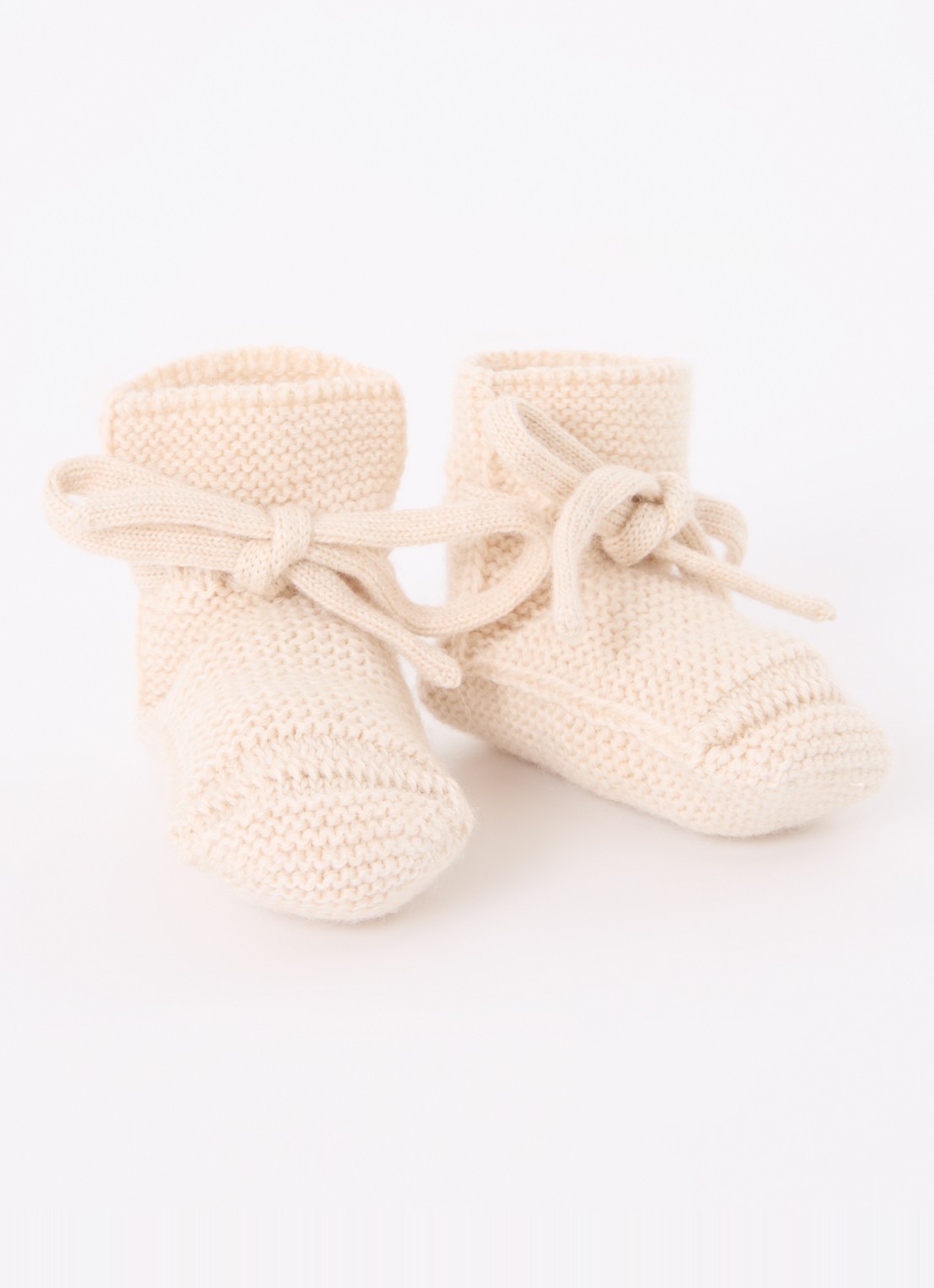 Hvid Gebreide babyslofjes van wol - voorkant gebroken wit