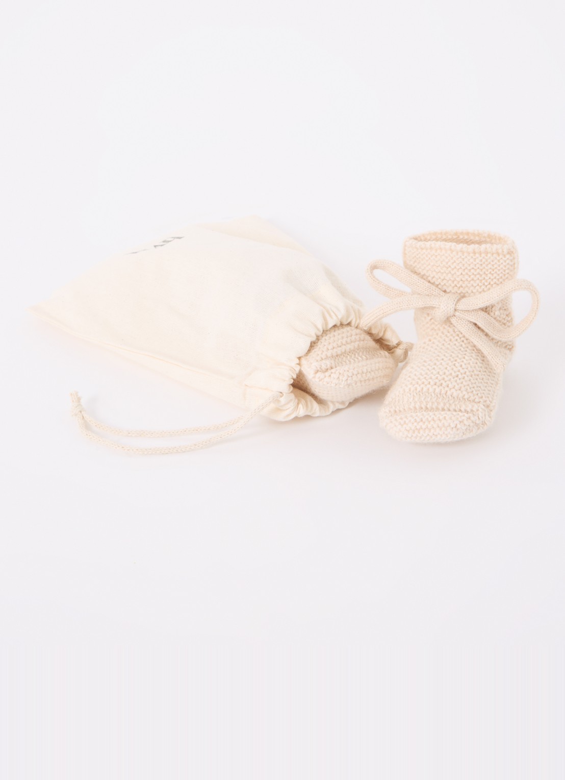 Hvid Gebreide babyslofjes van wol - voorkant 2 gebroken wit