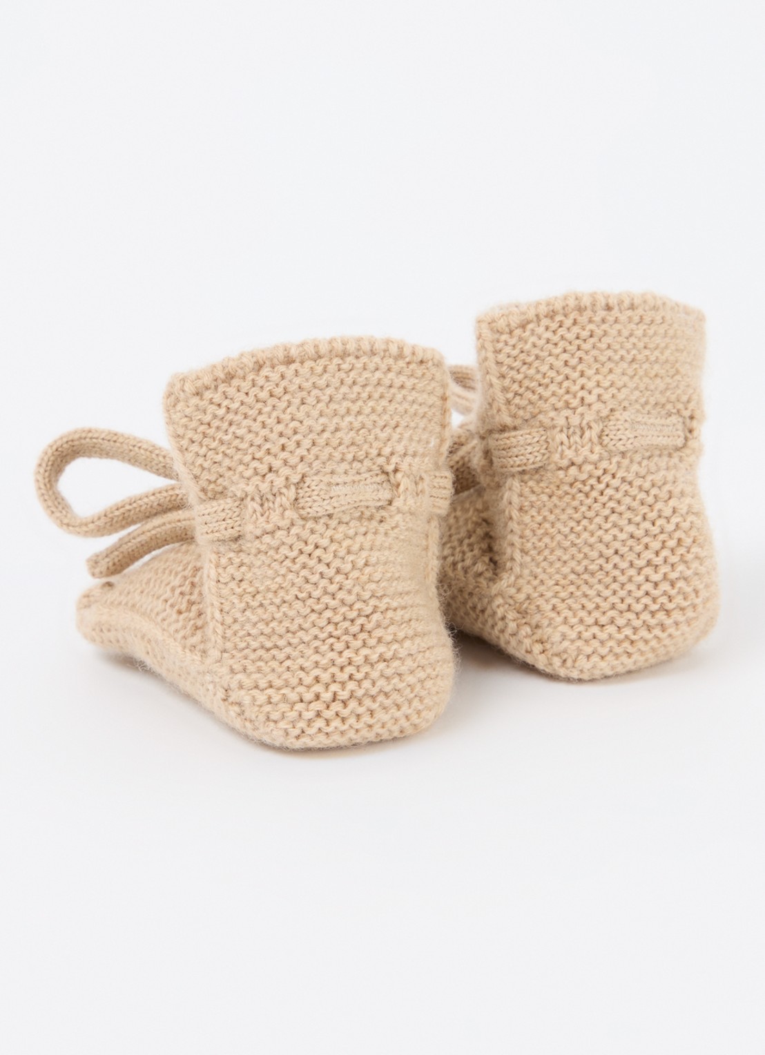 Hvid Gebreide babyslofjes van wol - achterkant beige