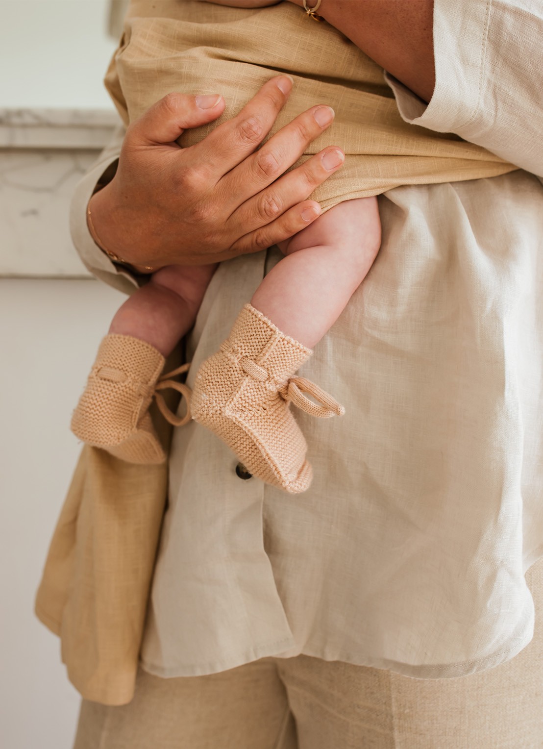 Hvid Gebreide babyslofjes van wol - voorkant 4 oudroze