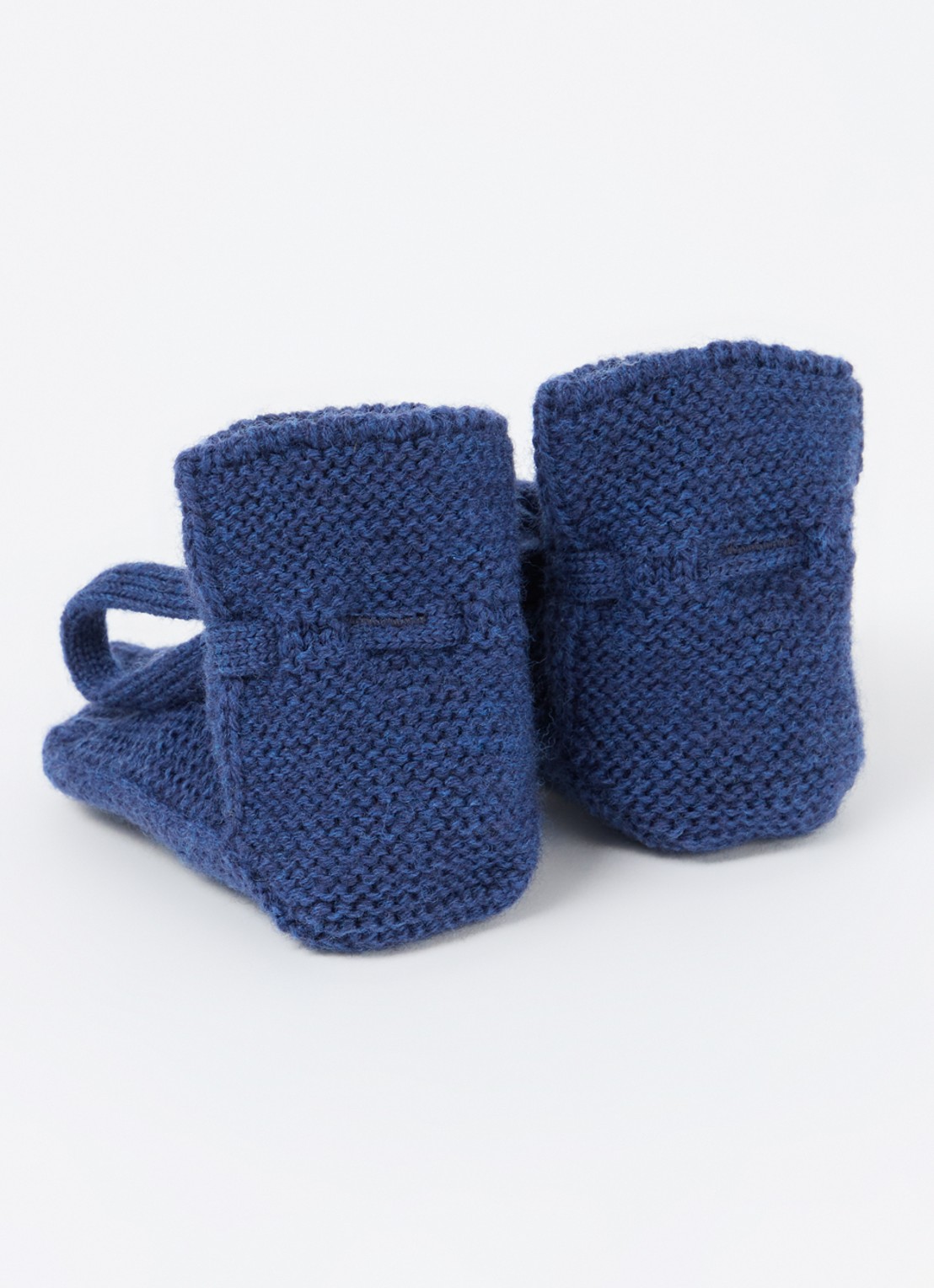 Hvid Gebreide babyslofjes van wol - achterkant royalblauw